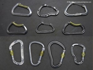 Top six: A selection of alloy and wire snap gate karabiners, with some straight and bent gates. Bottom four: Screwgates, all but the left hand one are HMS or Pear Shape karabiners